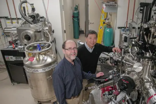 Two professors working in their lab